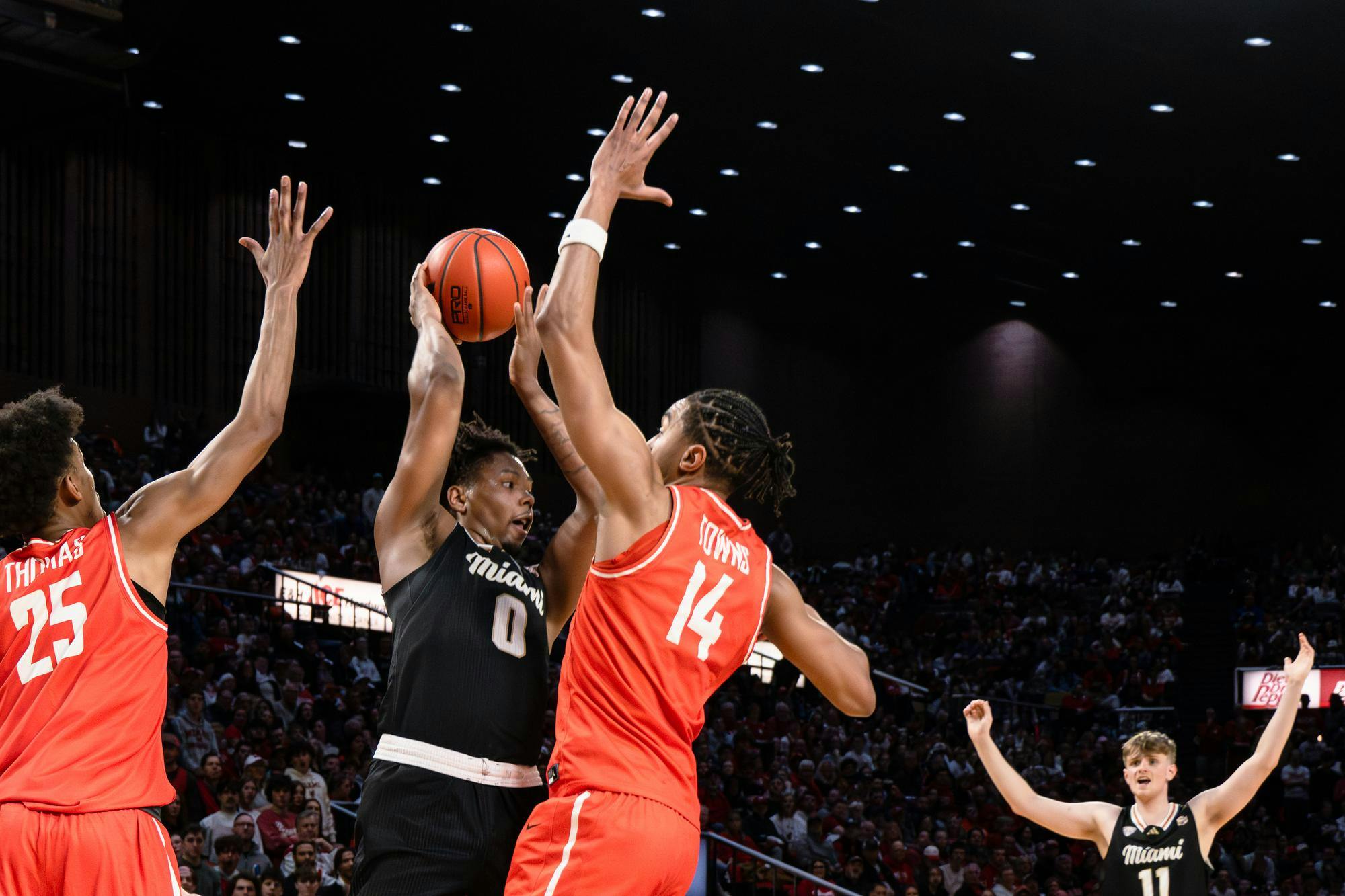 Junior wing Eian Elmer holds the ball against Bowling Green at Millett Hall on Feb. 20