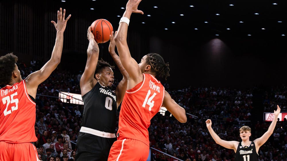 Junior wing Eian Elmer holds the ball against Bowling Green at Millett Hall on Feb. 20