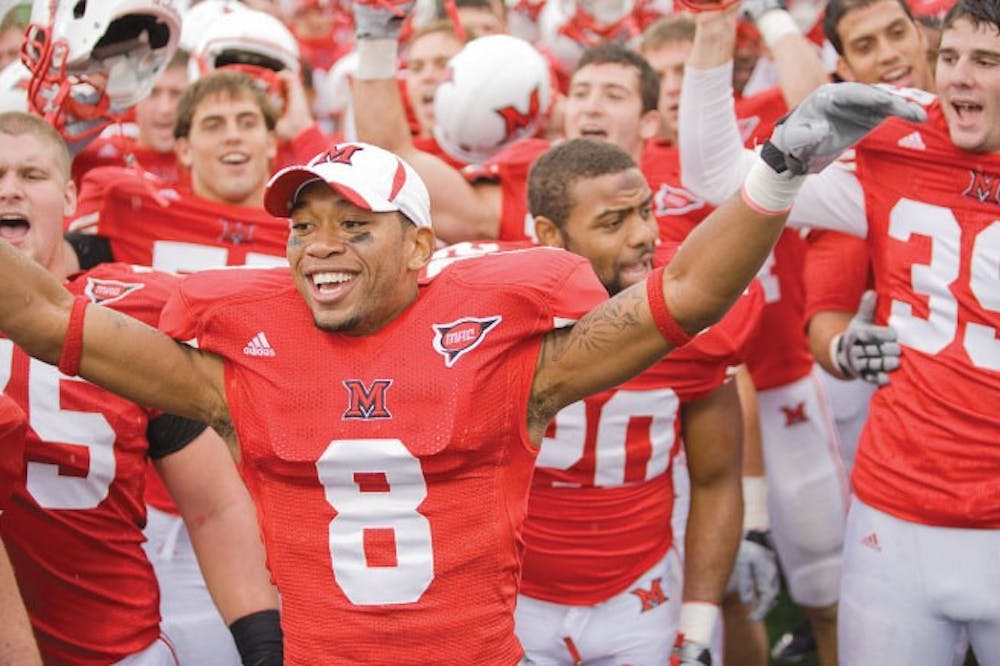 Freshman wide receiver Nick Harwell and his teammates celebrate a Miami victory Oct. 2 against Kent State University. 
