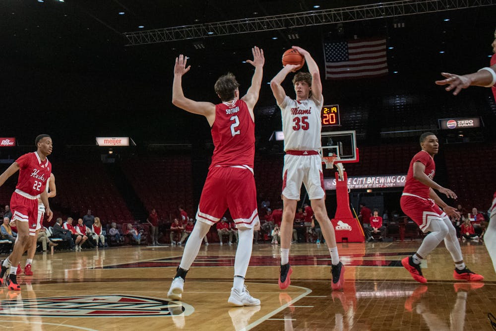 Sophomore center Reece Potter taking a shot against Northern Illinois at Millett Hall on Feb. 25