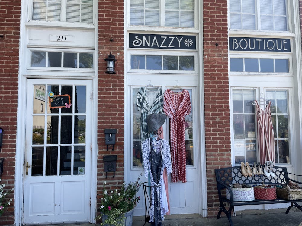 Many items are featured on the outside of Snazzy Boutique.