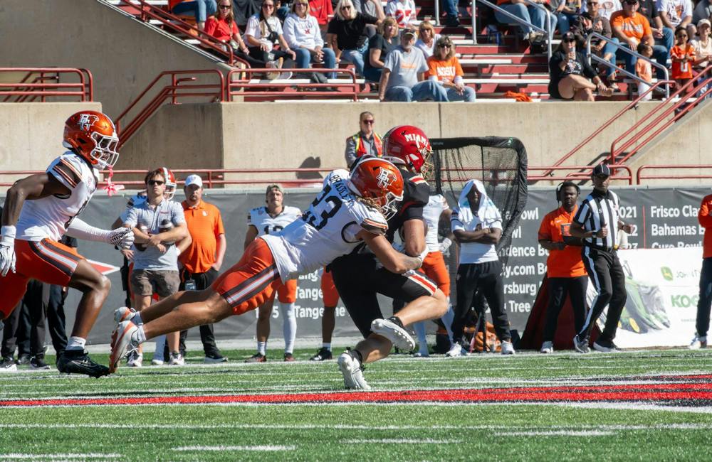 Senior quarterback Caleb Heavner gets tackled by Bowling Green State University defender in game on Oct. 3, 2026.
