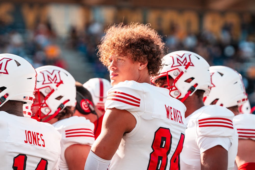 Cole Weaver on the sidelines against Cincinnati on Sept. 14