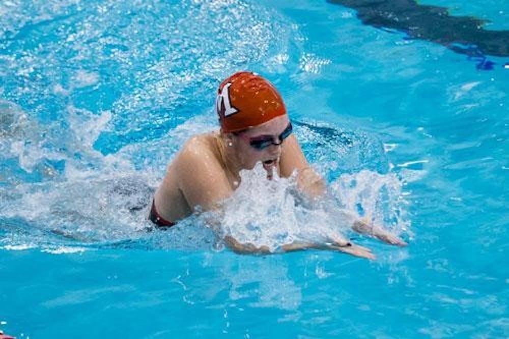 Miami sophomore swimmer Aubrey Kluth competes in the 100-yard breastroke during the men’s and women’s dual meet against Xavier University Oct. 19. Kluth took first place in the event. 