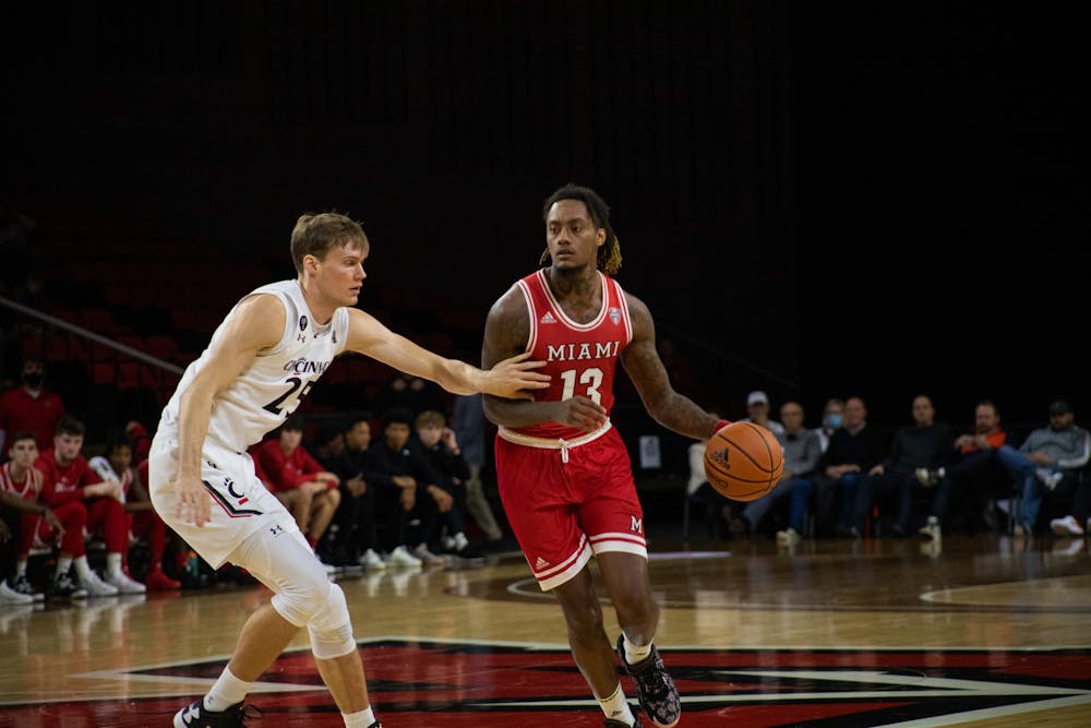 Senior forward Dalonte Brown drives past a defender during the team's Dec. 1 loss to Cincinnati.