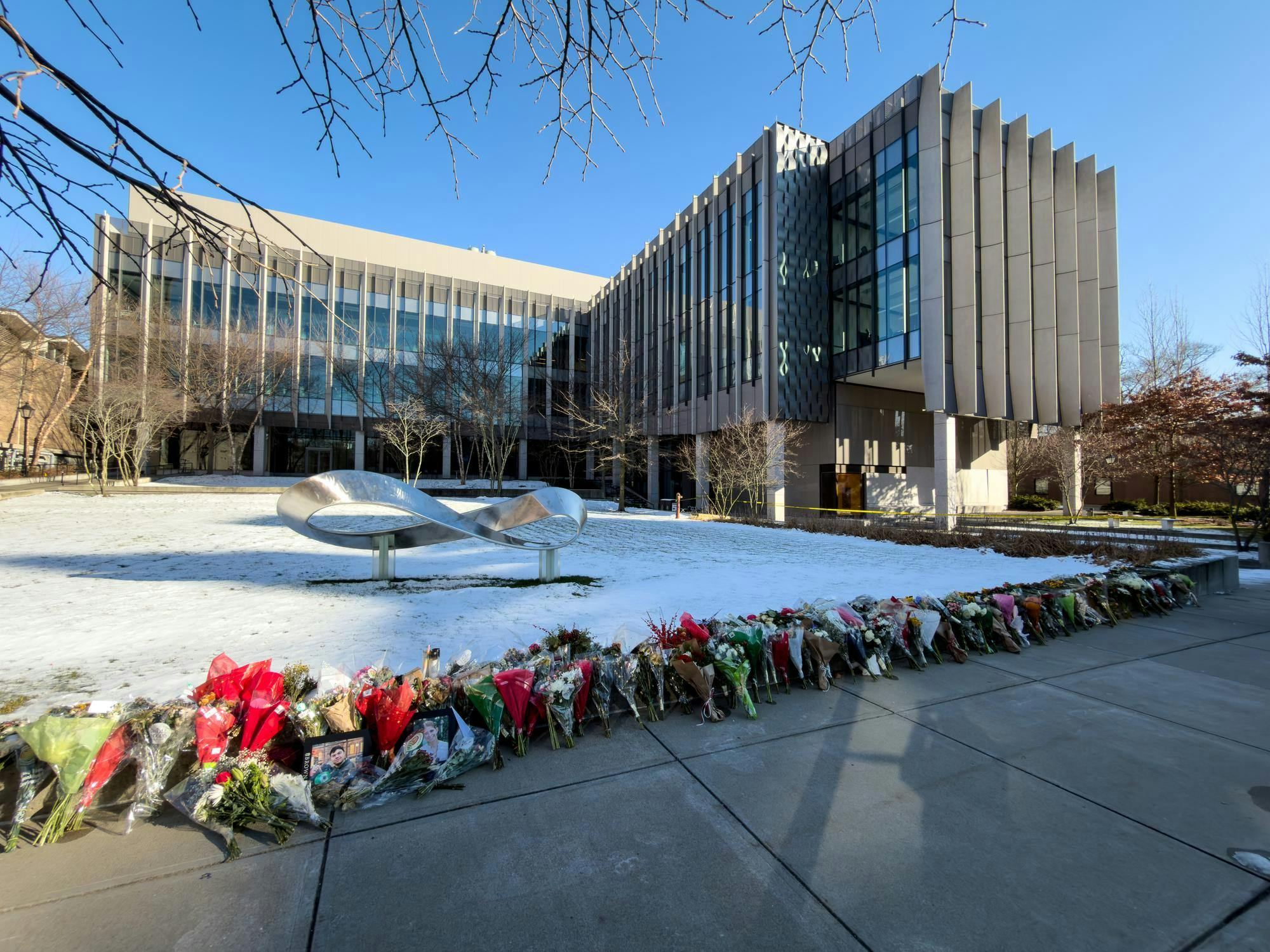 Memorial flowers were placed at Brown University's Engineering Research Center after the Dec. 13, 2025, shooting. Photo from Wikimedia Commons.