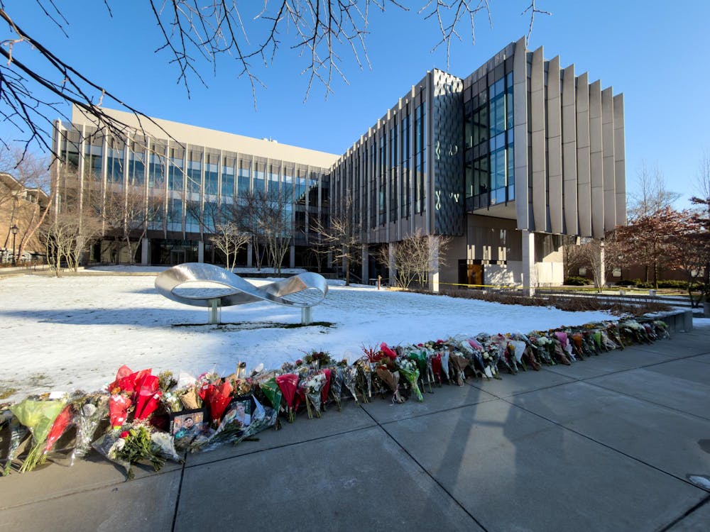 Memorial flowers were placed at Brown University's Engineering Research Center after the Dec. 13, 2025, shooting. Photo from Wikimedia Commons.