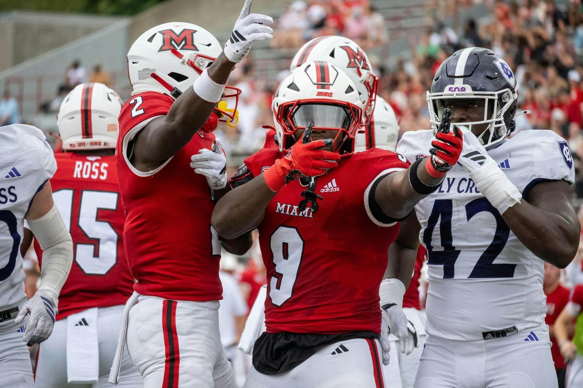 Redshirt sophomore running back D'Shawntae Jones signals for a first down in game against the College of the Holy Cross
