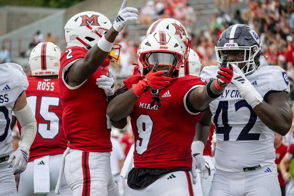 Redshirt sophomore running back D'Shawntae Jones signals for a first down in game against the College of the Holy Cross