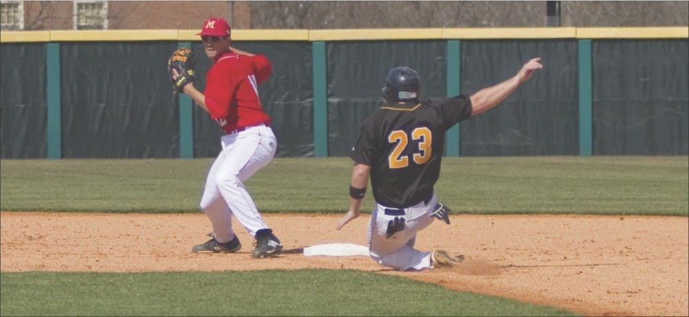 Junior Brad Gschwind makes a double play against Northern Kentucky University Wednesday, March 17.