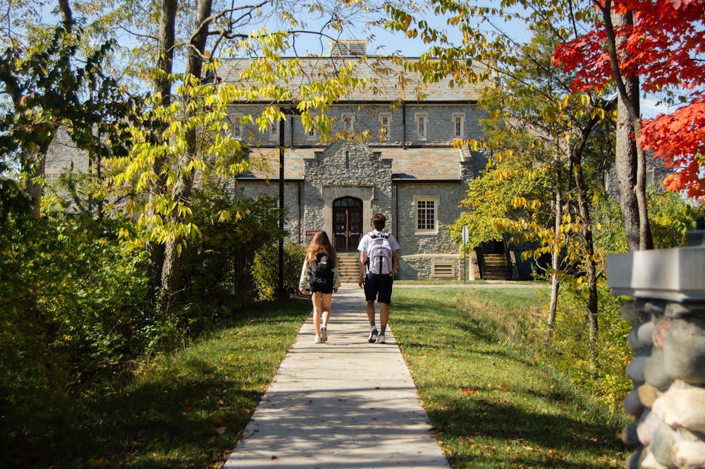 <p>Despite the new guy in front of her, this first-year student struggles to forget about the boy from home.﻿ Photo from The Miami Student Archives.</p>