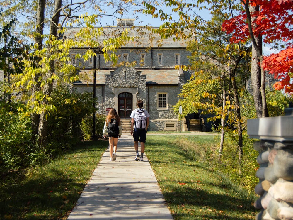 Despite the new guy in front of her, this first-year student struggles to forget about the boy from home. Photo from The Miami Student Archives.
