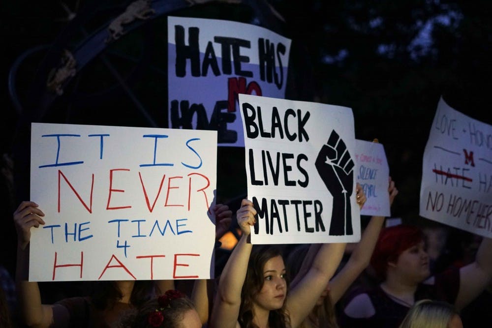 Marchers gather at the Miami University Sundial.

Photo by Ryan Terhune