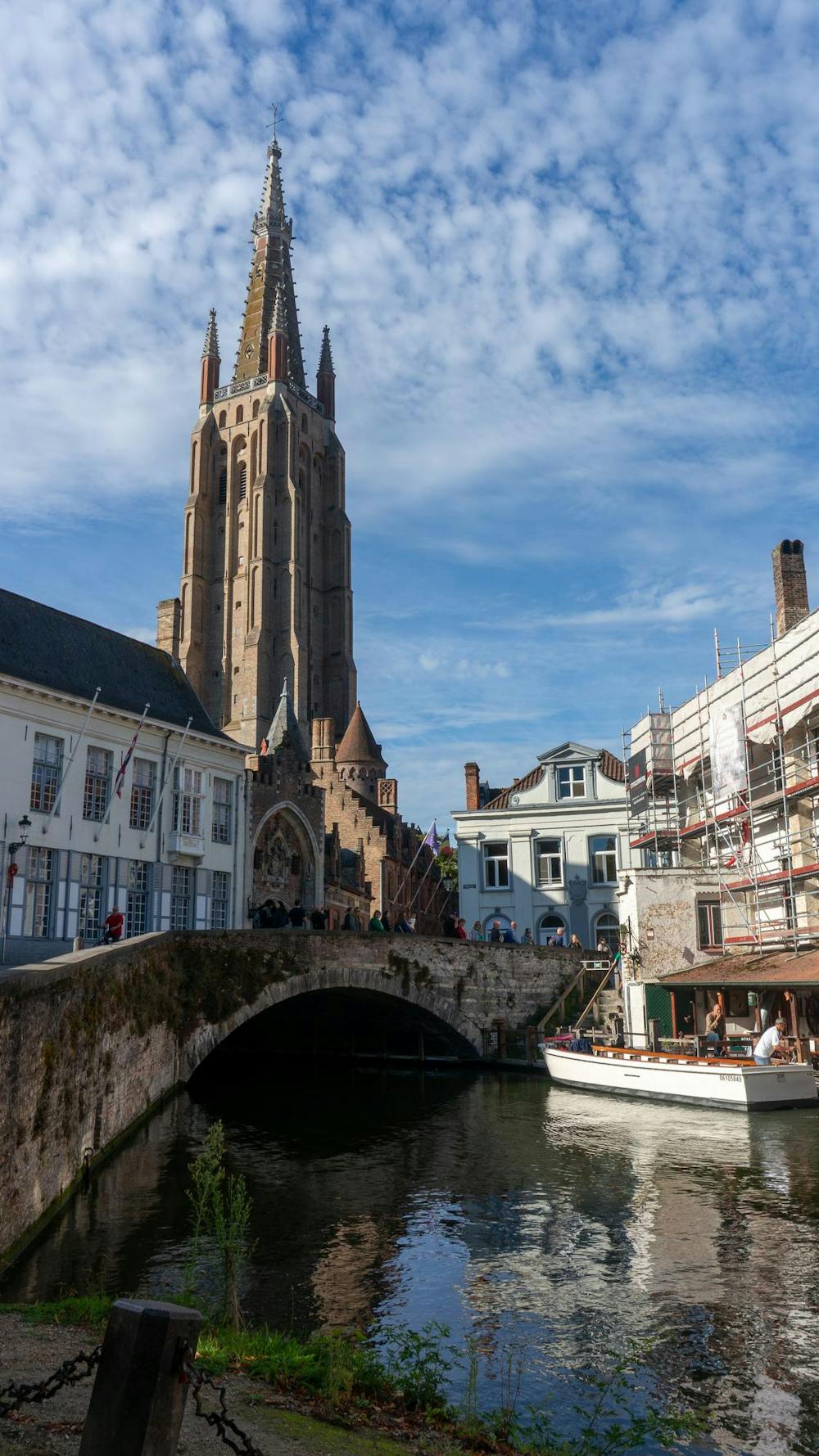 The Church of Our Lady overlooks one of Bruges, Belgium’s many canals.
