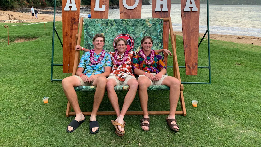 Micheal Weber, Brett Podinbinski, and Cameron Pero hanging out on the beach during their trip to Kauai, Hawaii. Photo courtesy of Cameron Pero