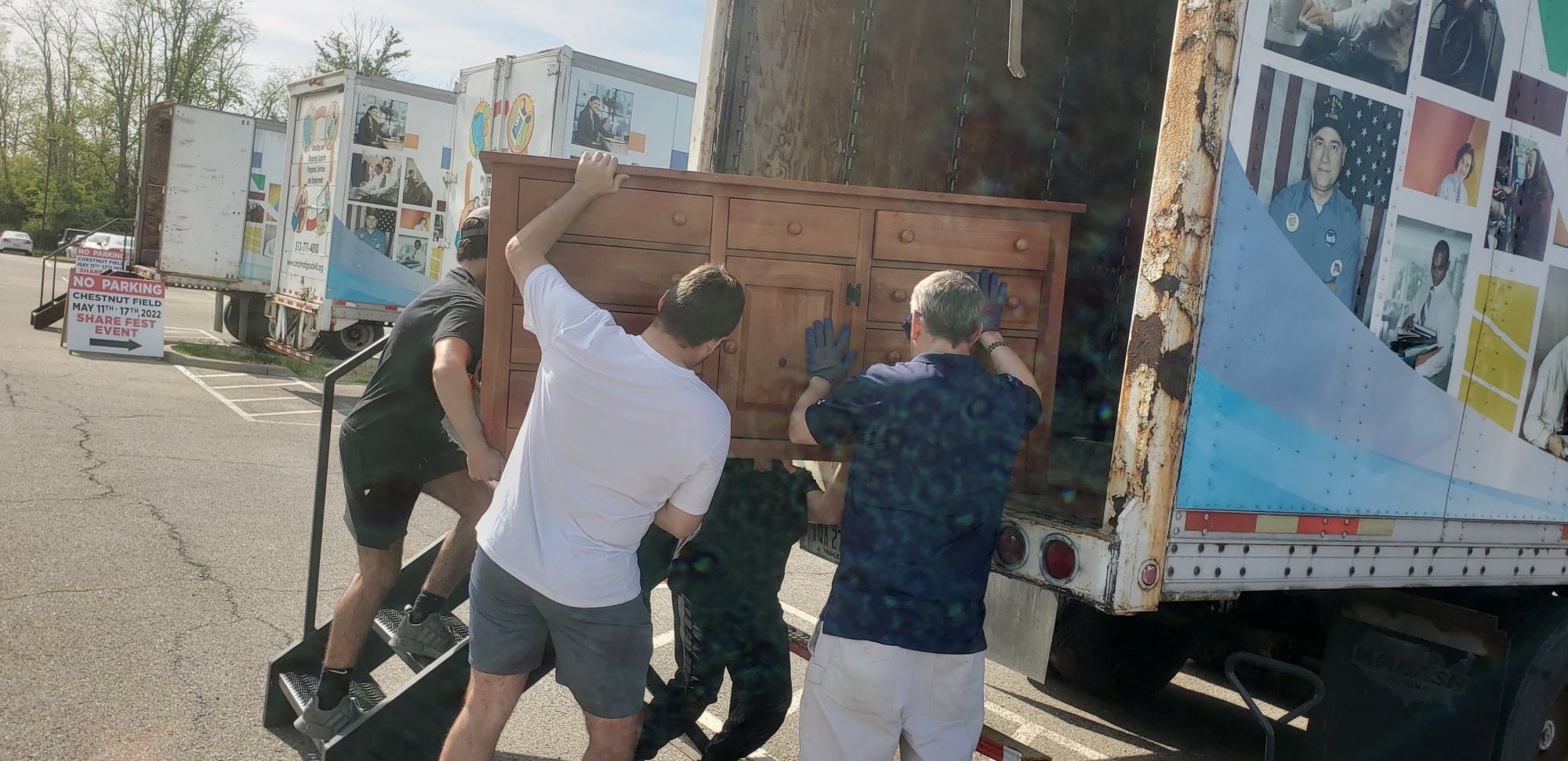 Volunteers load donated items into the back of semi trucks before they are brought to partner organizations. Photo provided by Rob Abowitz