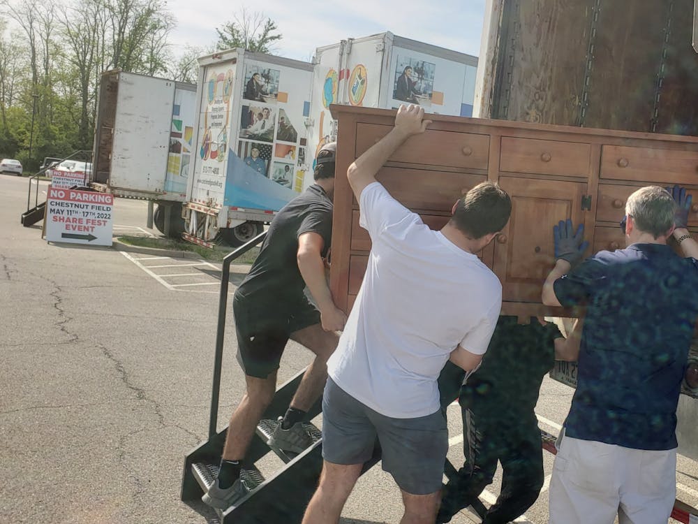 Volunteers load donated items into the back of semi trucks before they are brought to partner organizations. Photo provided by Rob Abowitz