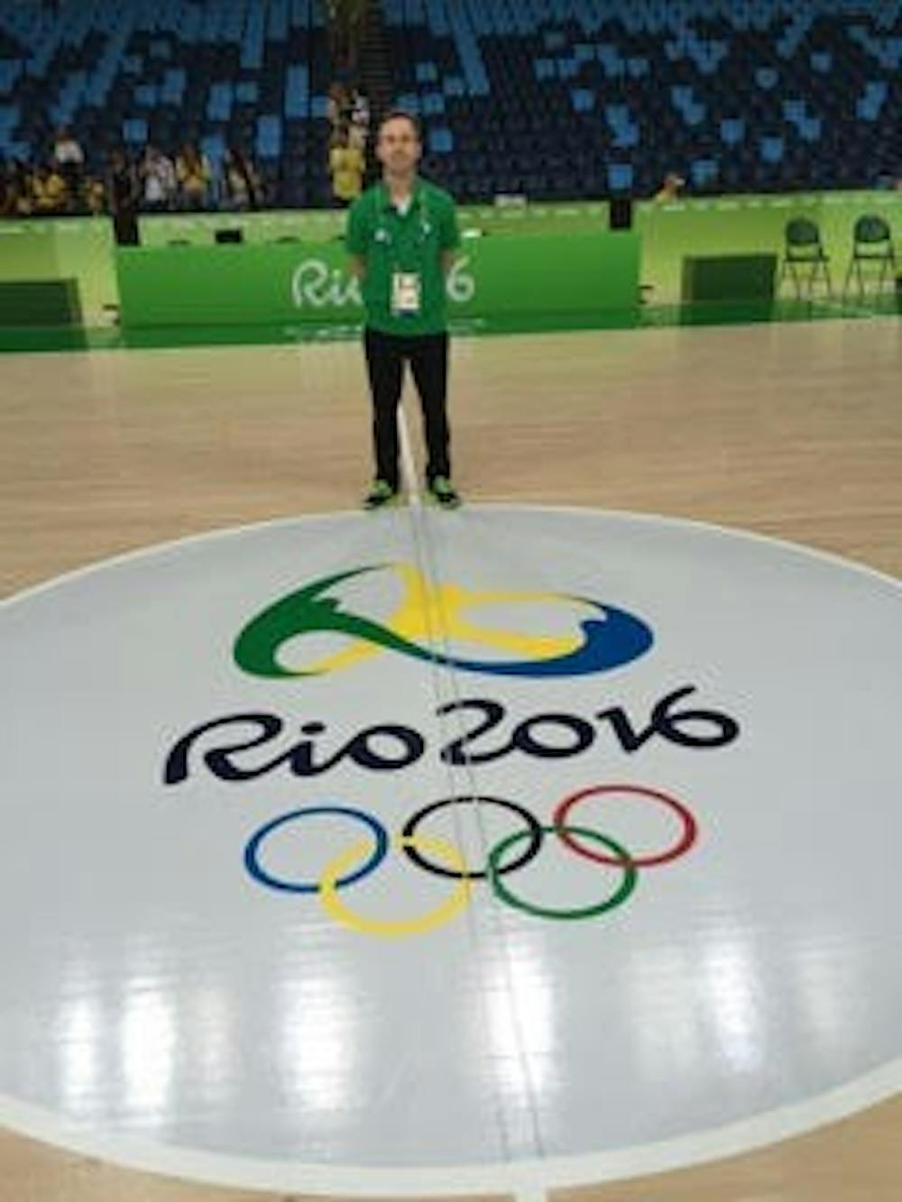 Chris Leazier, a Miami grad and the assistant coach of the Nigerian Olympic basketball team, stands on the court in Rio. 