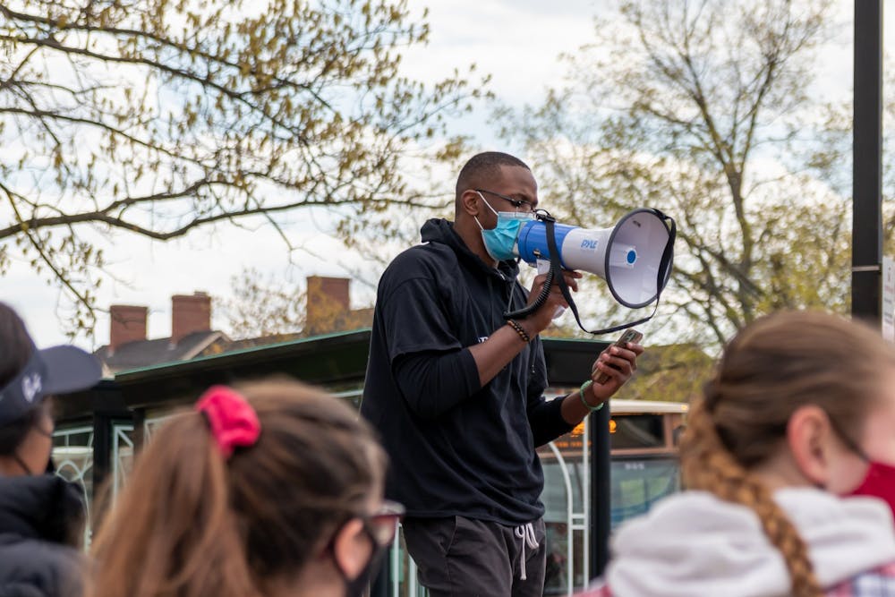 <p>Sophomore Nigel McKinney read a poem to the crowd about the daily experience and fears of Black people in the United States to kick off the protest.</p>
