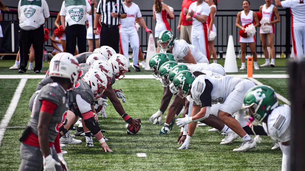 The Miami RedHawks football team lines up against the Eastern Michigan Eagles on Oct. 18, 2025.