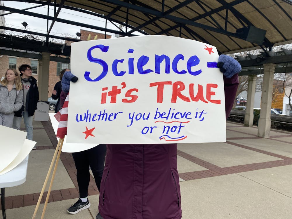 Protestors made signs at the event that reaffirmed the integrity of science.