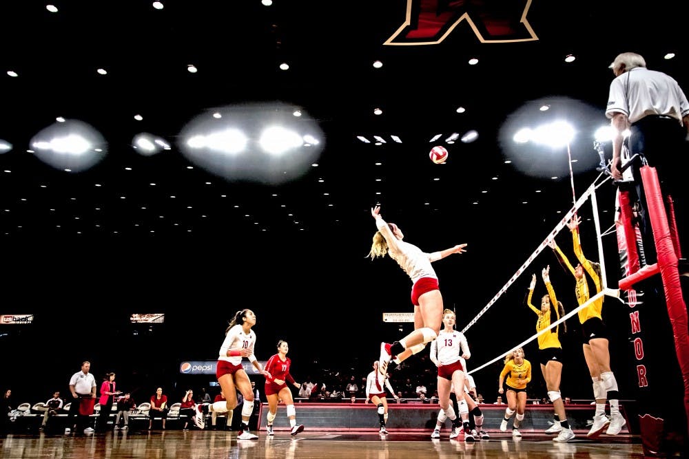 Junior outside hitter Gaby Harper (pictured, no. 10) and senior libero Abigail Huser (pictured, in red) have made a big impact so far for the RedHawks.