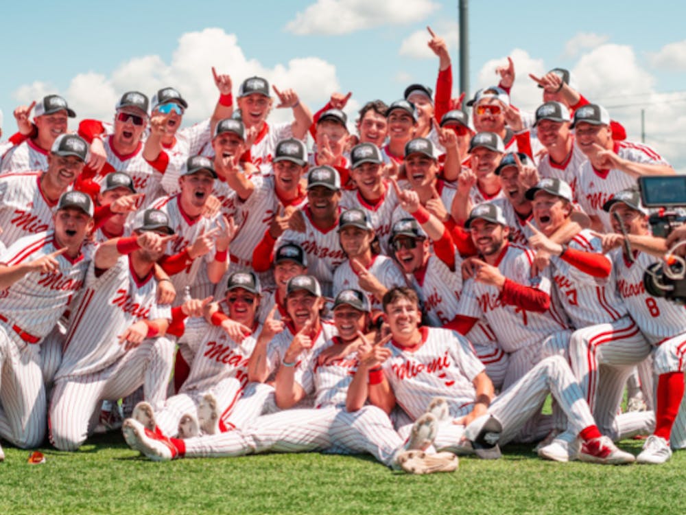 The Miami baseball team celebrates winning the 2025 MAC championship in Avon, Ohio
