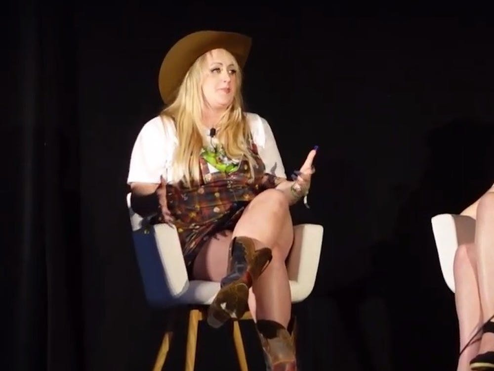 Brittany Broski, pictured here on the left, uploads episodes of her podcast, "Violating Community Guidelines," each Monday.