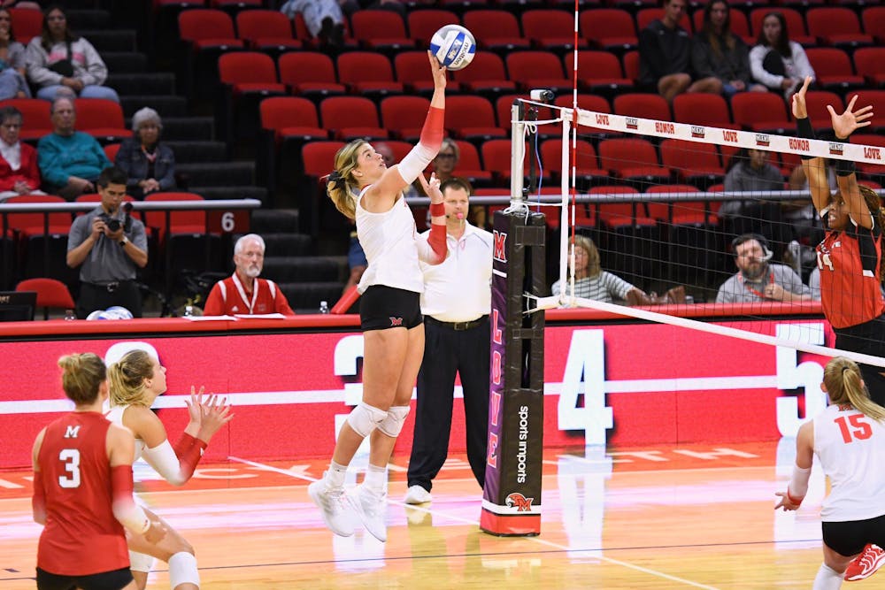 Raegan Lantz returns the volleyball against the Ohio State University Buckeyes in the RedHawks' season opener on Sept. 3.