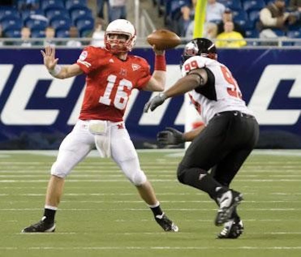 Freshman quarterback Austin Boucher looks for a receiver Dec. 3 against Northern Illinois University.
