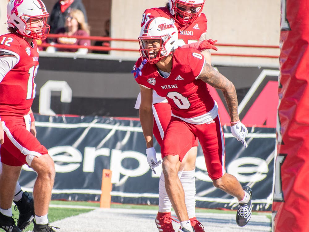 Receiver Reggie Virgil celebrating a touchdown pass from backup quarterback Henry Hesson in the second quarter against Central Michigan last week