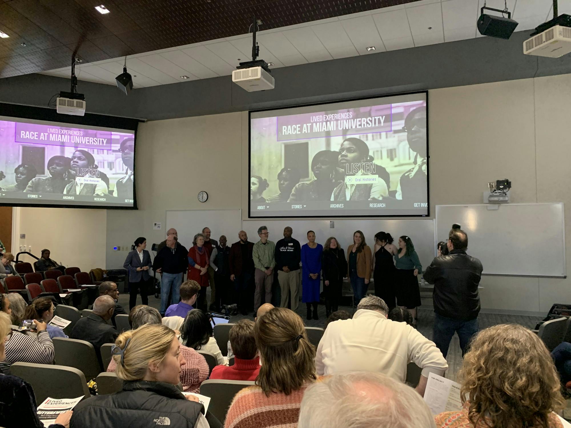 Contributors to the documentary and the Lived Experiences project gather for a group picture before the premiere.