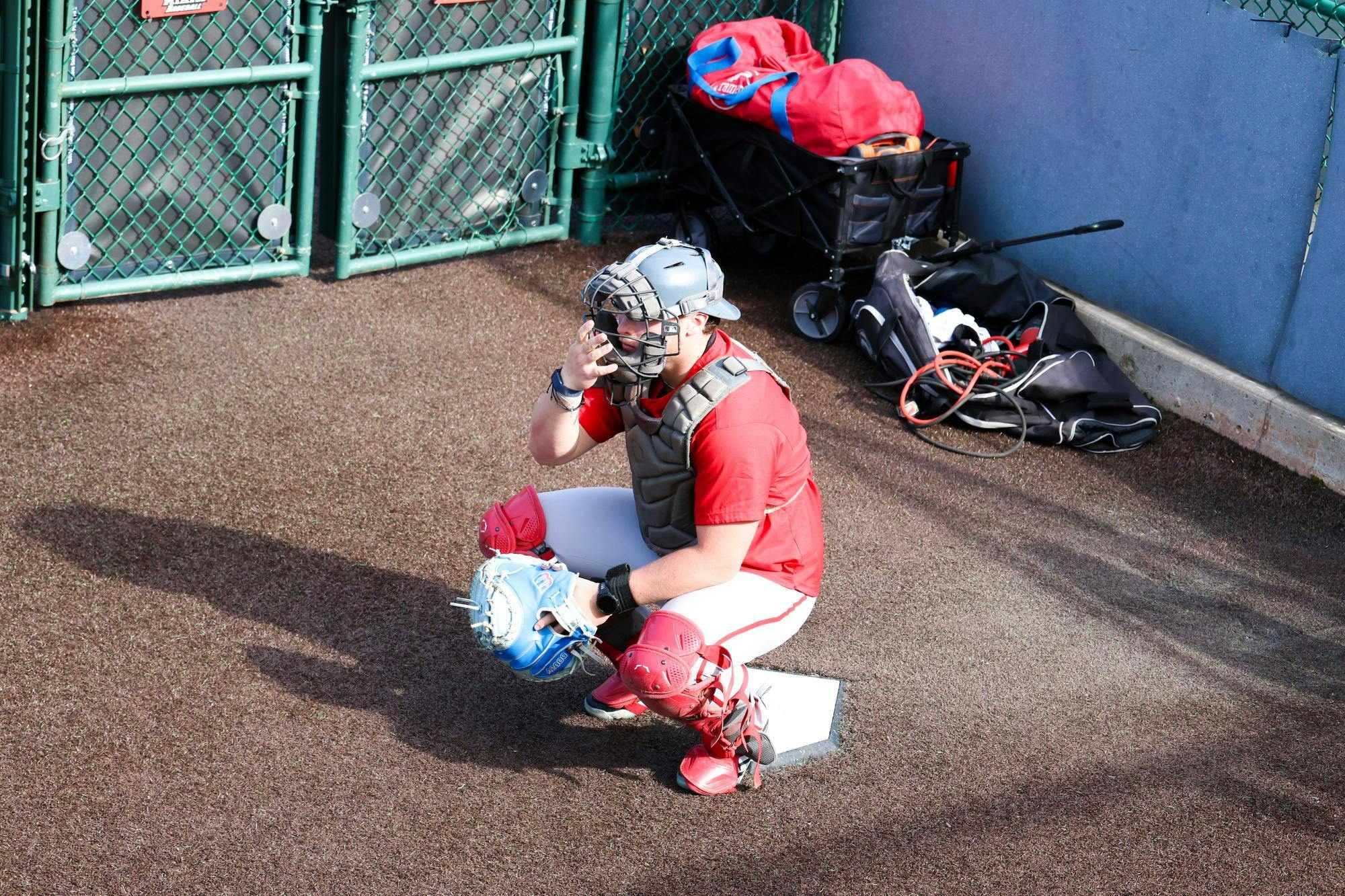 Sophomore Joey Heenan in the bullpen at McKie Field.