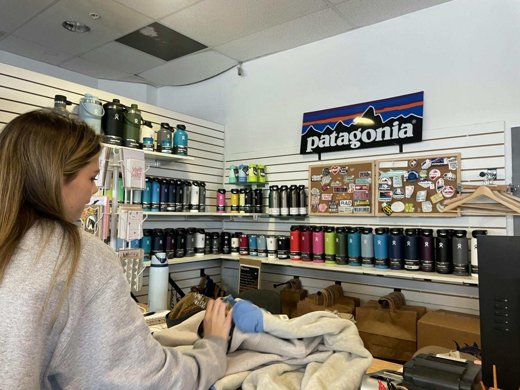 Rowell purchases a sweatshirt at Walker’s counter.