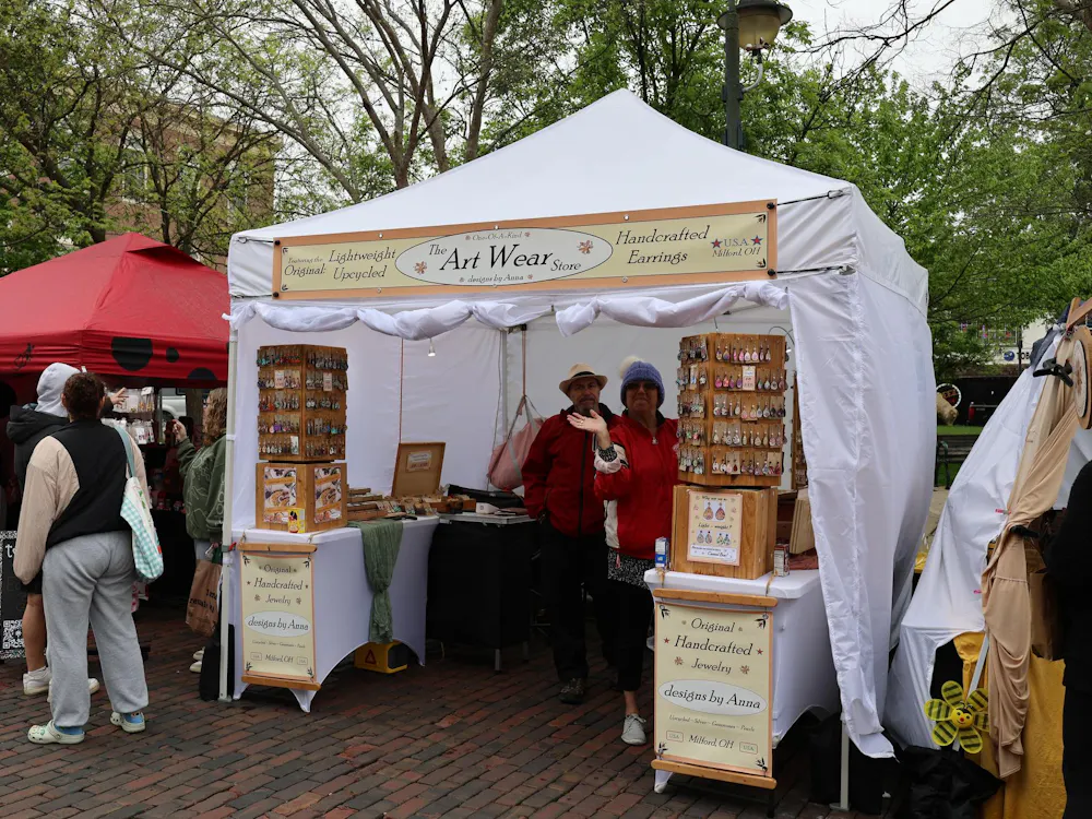 People gather around a tent