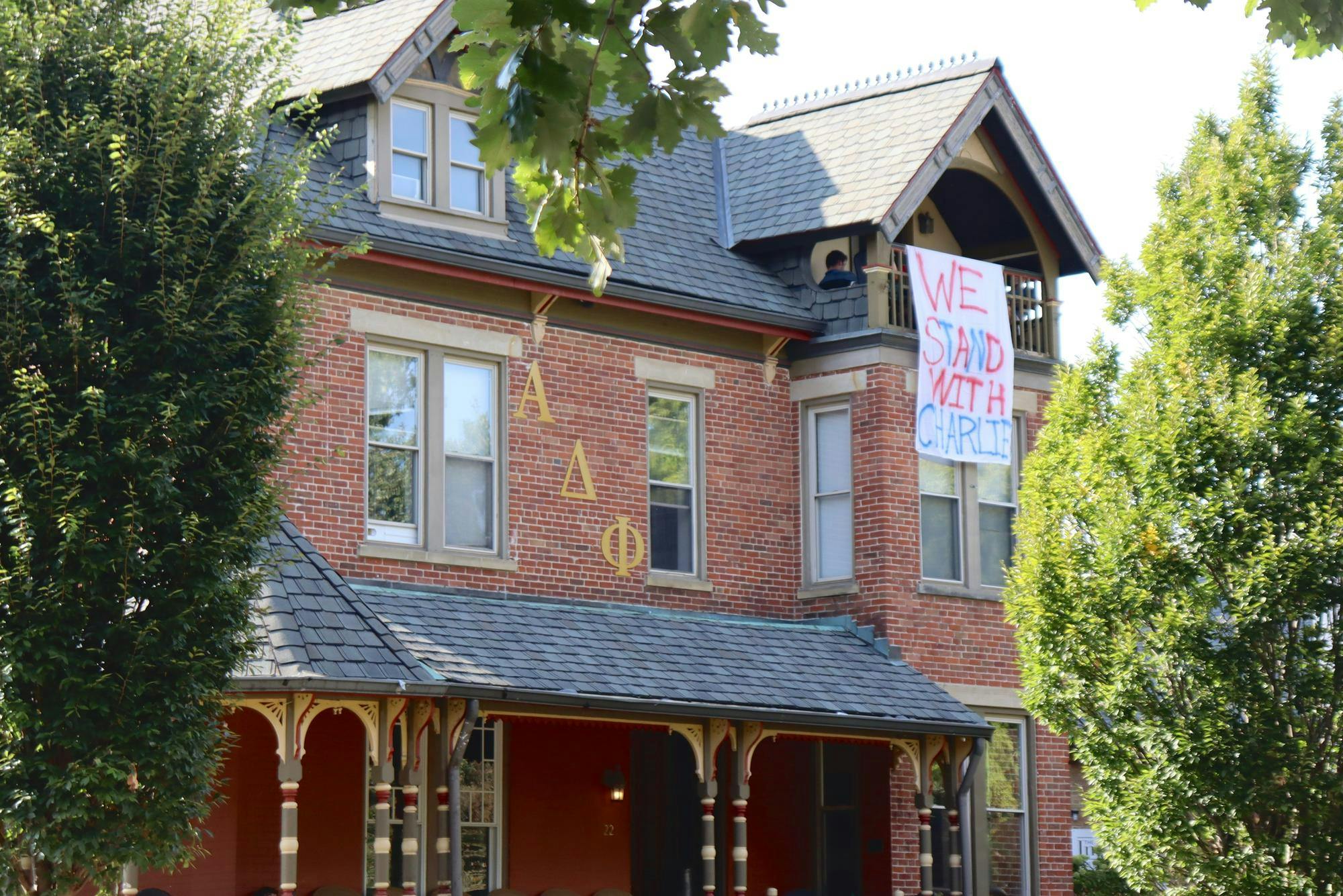 Members of Alpha Delta Phi, Miami’s oldest fraternity on campus, hung a banner outside their chapter house on South Campus Avenue in support of Charlie Kirk following his assassination.&nbsp;