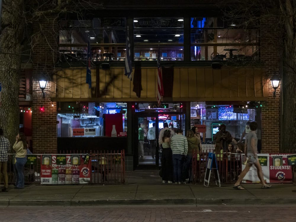First-year student Cece hopes to get home without incident while walking home at night. Photo from The Miami Student Archives.