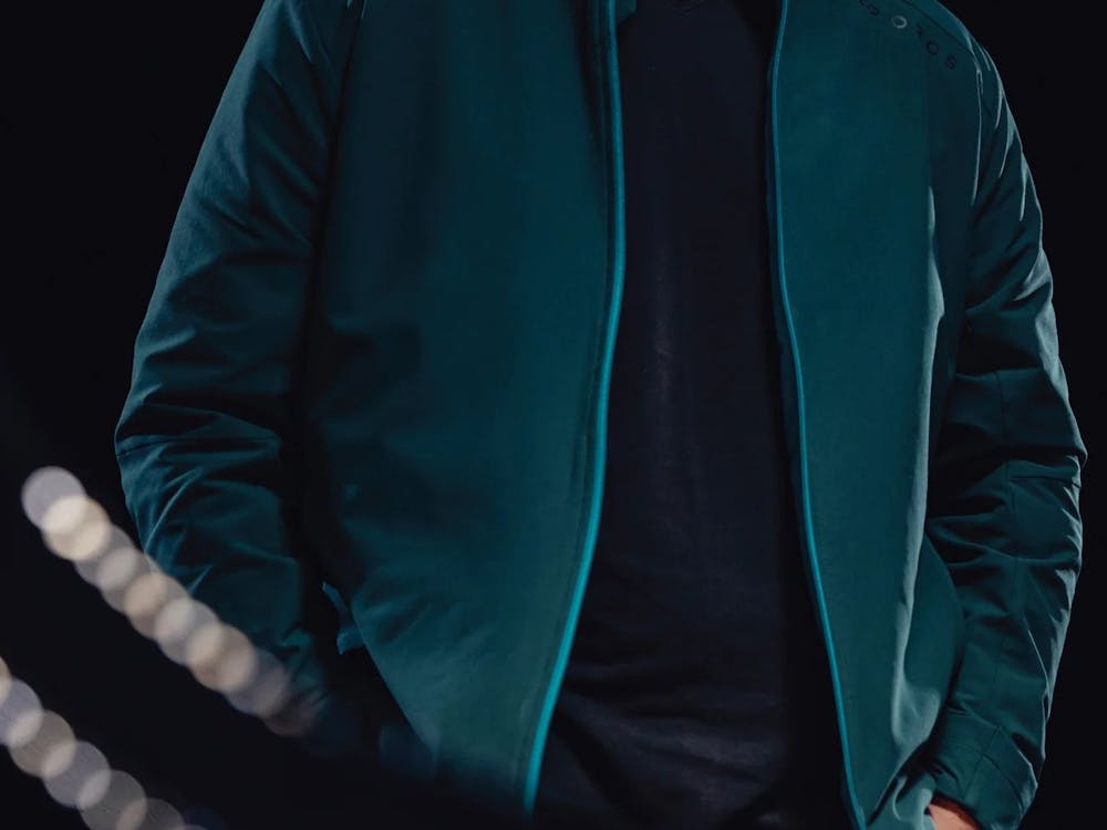 Michael Markesbery, co-founder of OROS, poses in his merchandise.