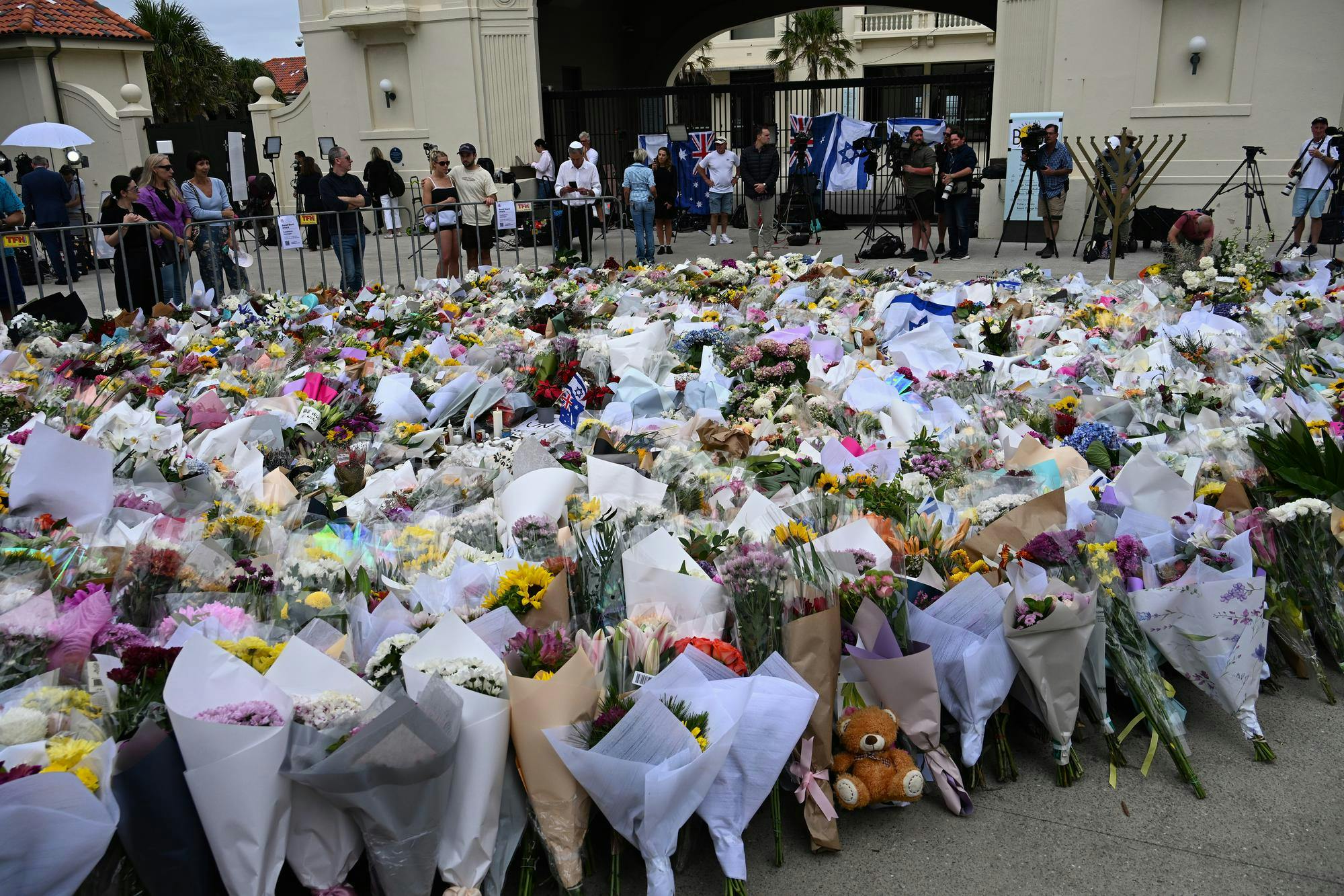 Flowers placed at Bondi Beach, Sydney, after a 2025 shooting at a Hanukkah celebration. Photo from Wikimedia Commons