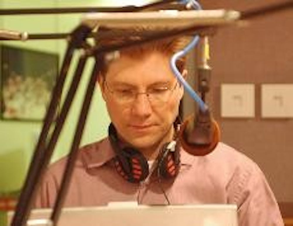 Radio host, Gary Scott, prepares a broadcast on WMUB Thursday afternoon.