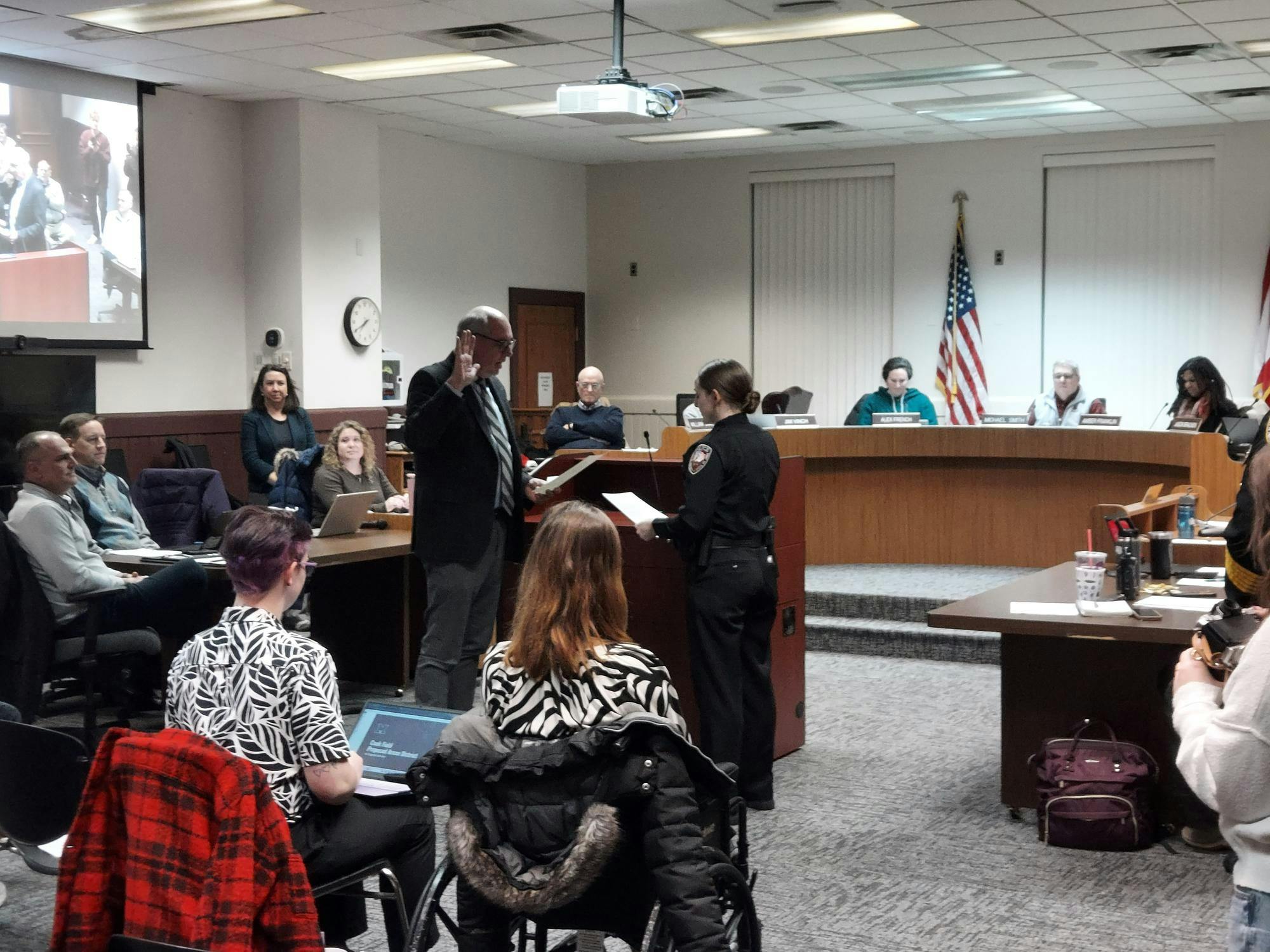 Elana Schwartz, a Miami University alumna is sworn in to the Oxford Police Department by Chief John Jones.