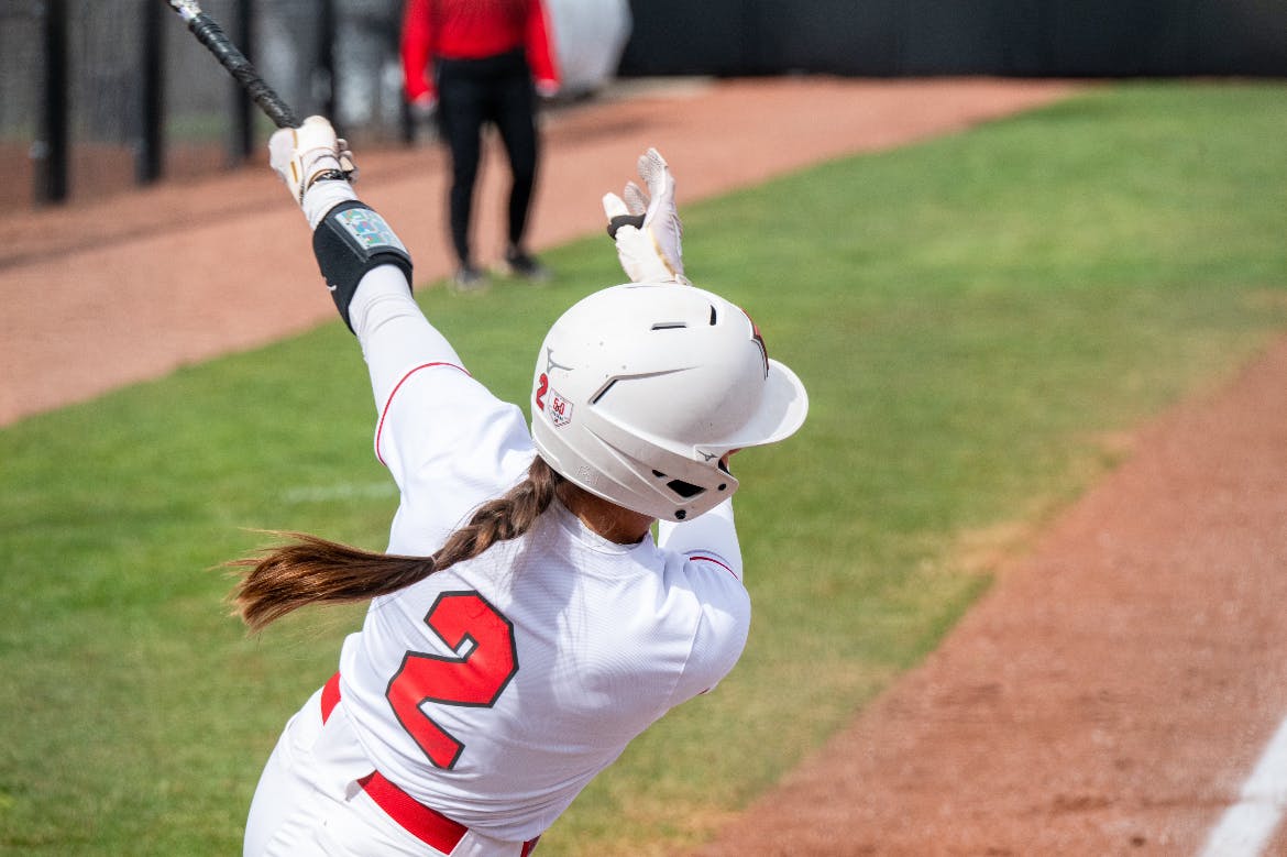 Senior outfielder Jenna Golembiewski swings at a pitch against the Northern Illinois University Huskies on March 21 at Miami's softball stadium