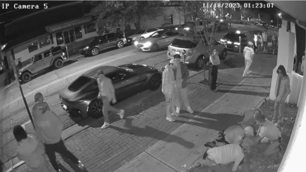 A surveillance camera outside Brick Street Bar shows an Oxford police officer using force to restrain a Miami University student.﻿
