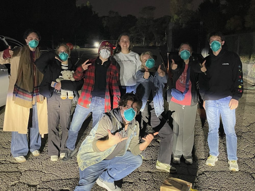 Inside Hollywood students pose for a picture after walking through a smoke-filled Los Angeles on Jan. 8.