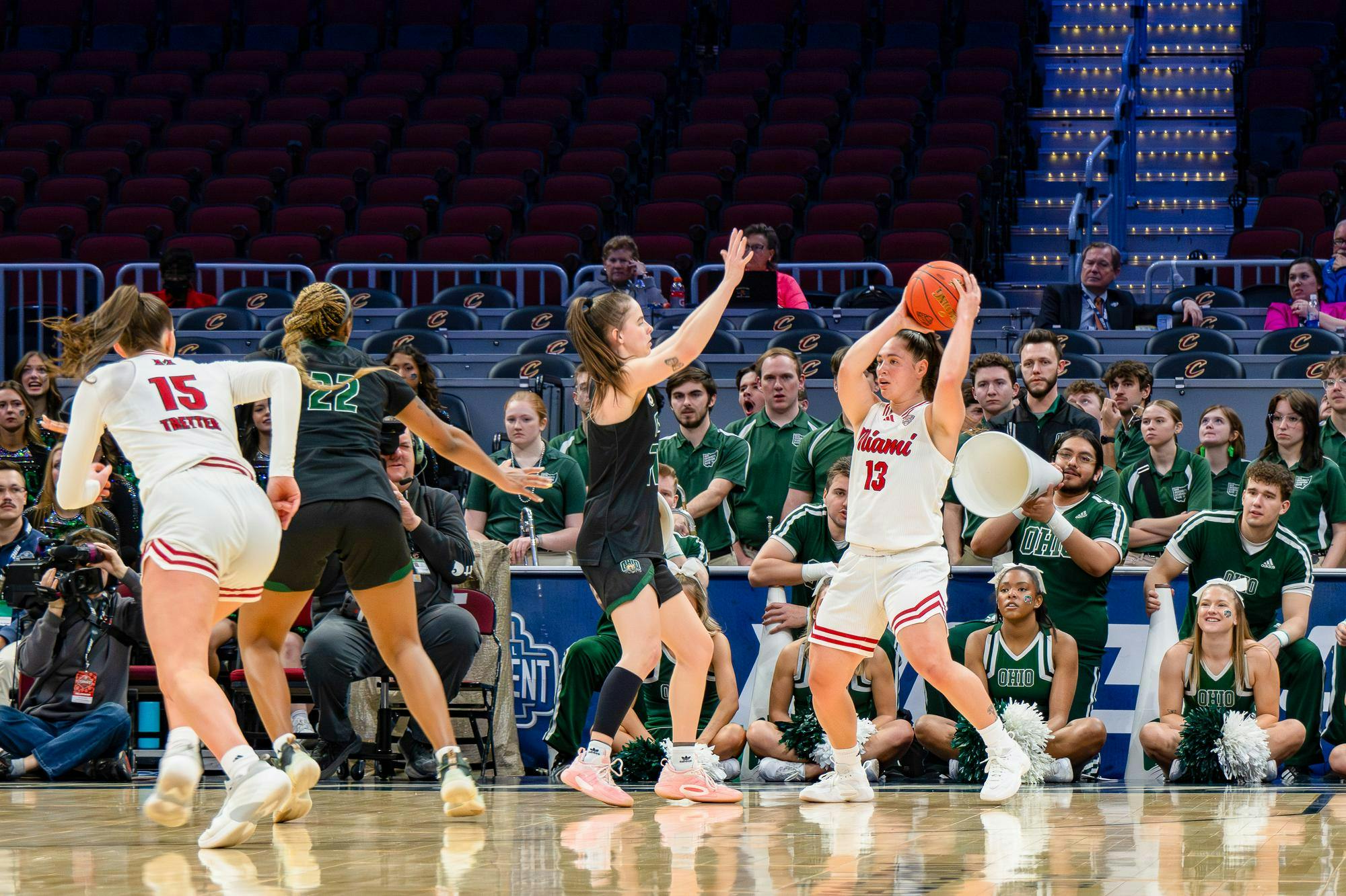 Tamar Singer looks to pass the ball to Amber Tretter in game 2 of the MAC Tournament against Ohio University.