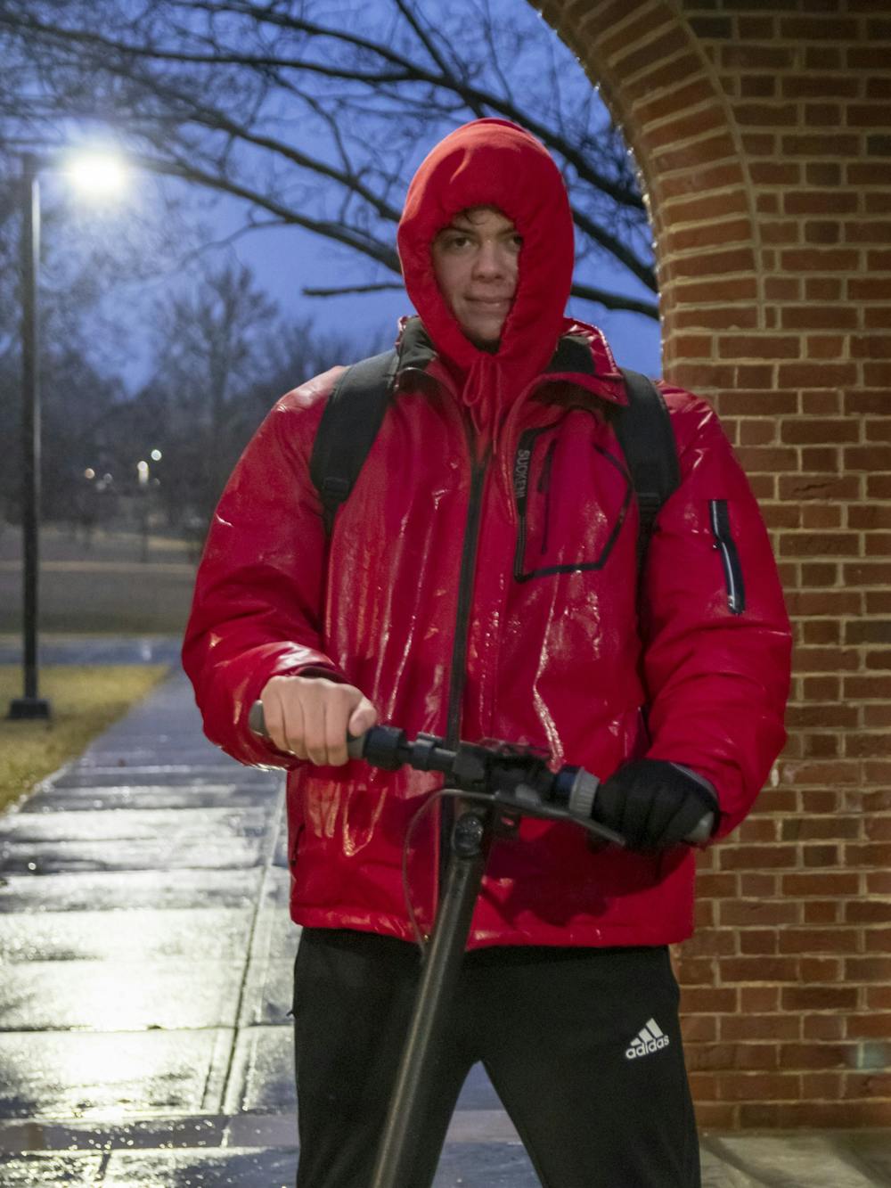 Andrew Kutte, first-year accounting major, braved the rain to make a Snag delivery on Feb. 14.