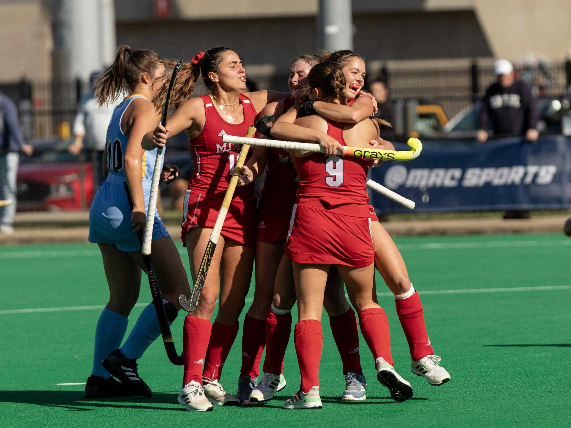 The team celebrates junior striker Reese Wearren's goal that put Miami on the board. The RedHawks never gave up their lead, prevailing 3-1 and making themselves MAC champions.