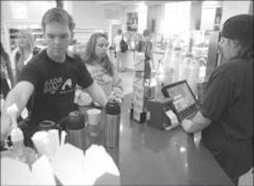 Students enjoy the new dining options available at Dividend$ in the Farmer School of Business.