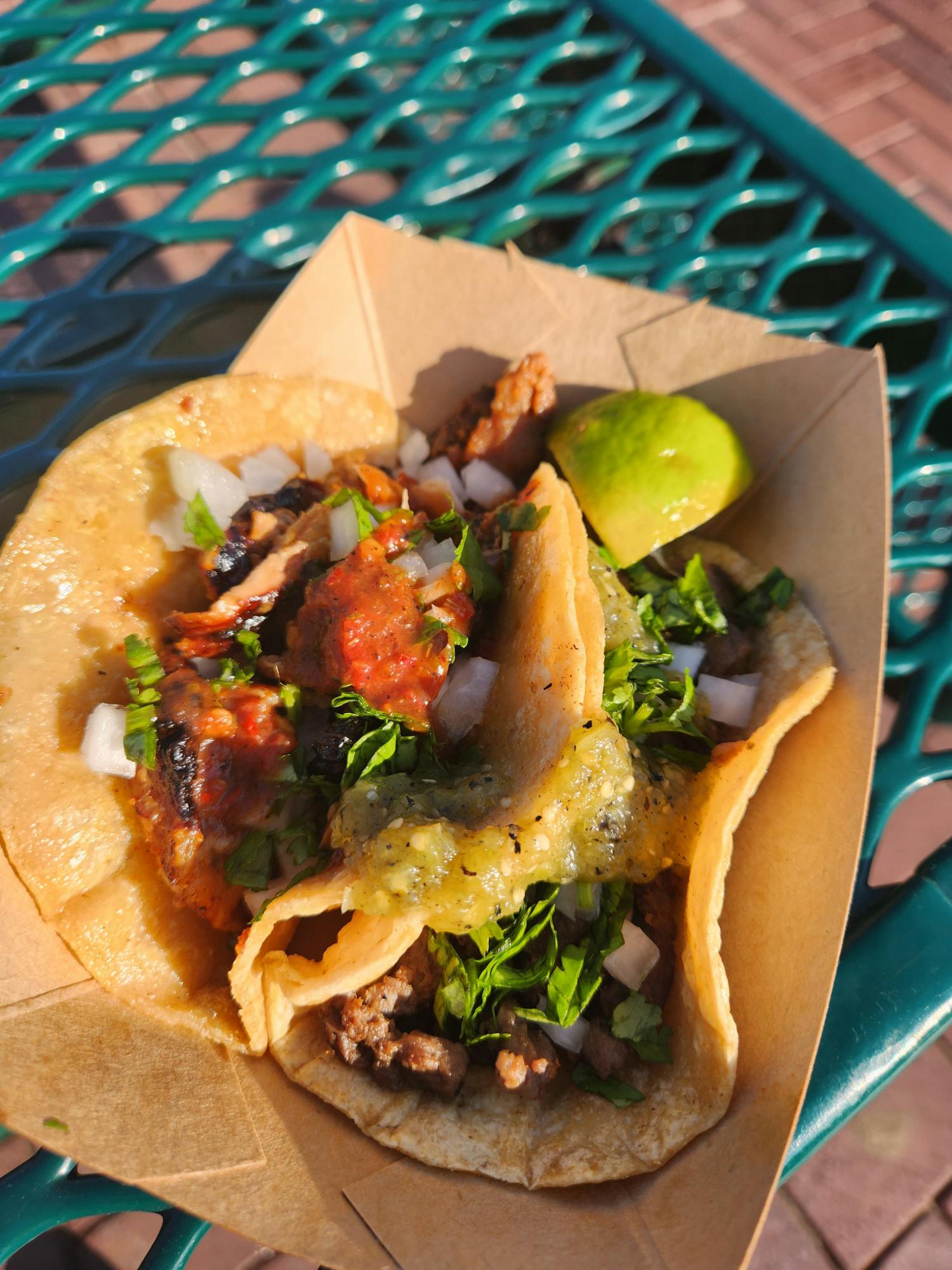 Hatch tried tacos from El Cardenal at the festival, which were Carne Asada (left) and Al Pastor (right).