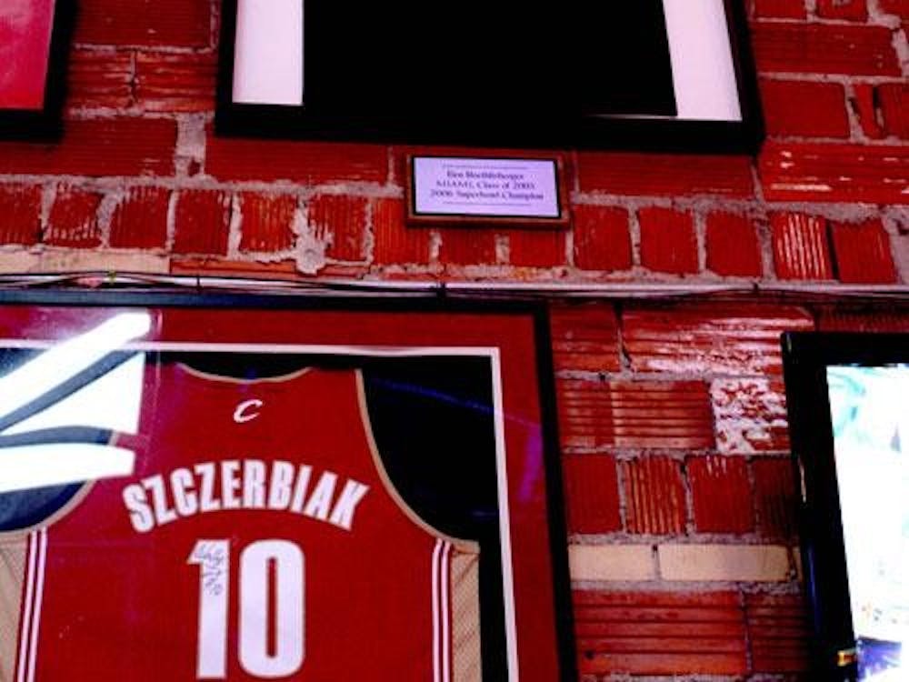 The jerseys of former Miami athletes Ben Roethlisberger and Wally Szczerbiak hang on the wall of Brick Street.